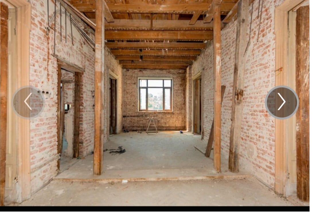 Main Salon with Exposed Brick